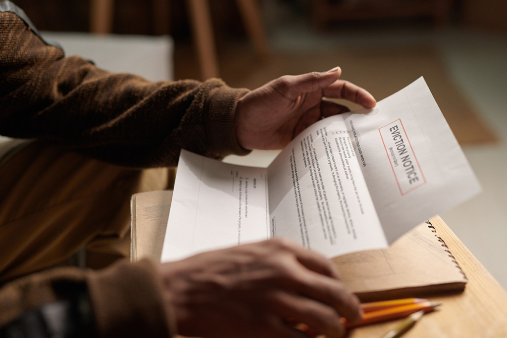 a tenant reads an eviction notice