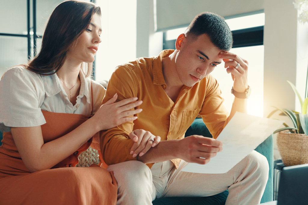 a couple reviews an eviction notice