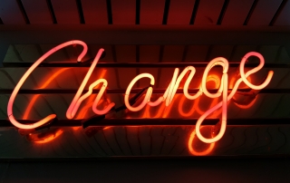 Neon sign says change